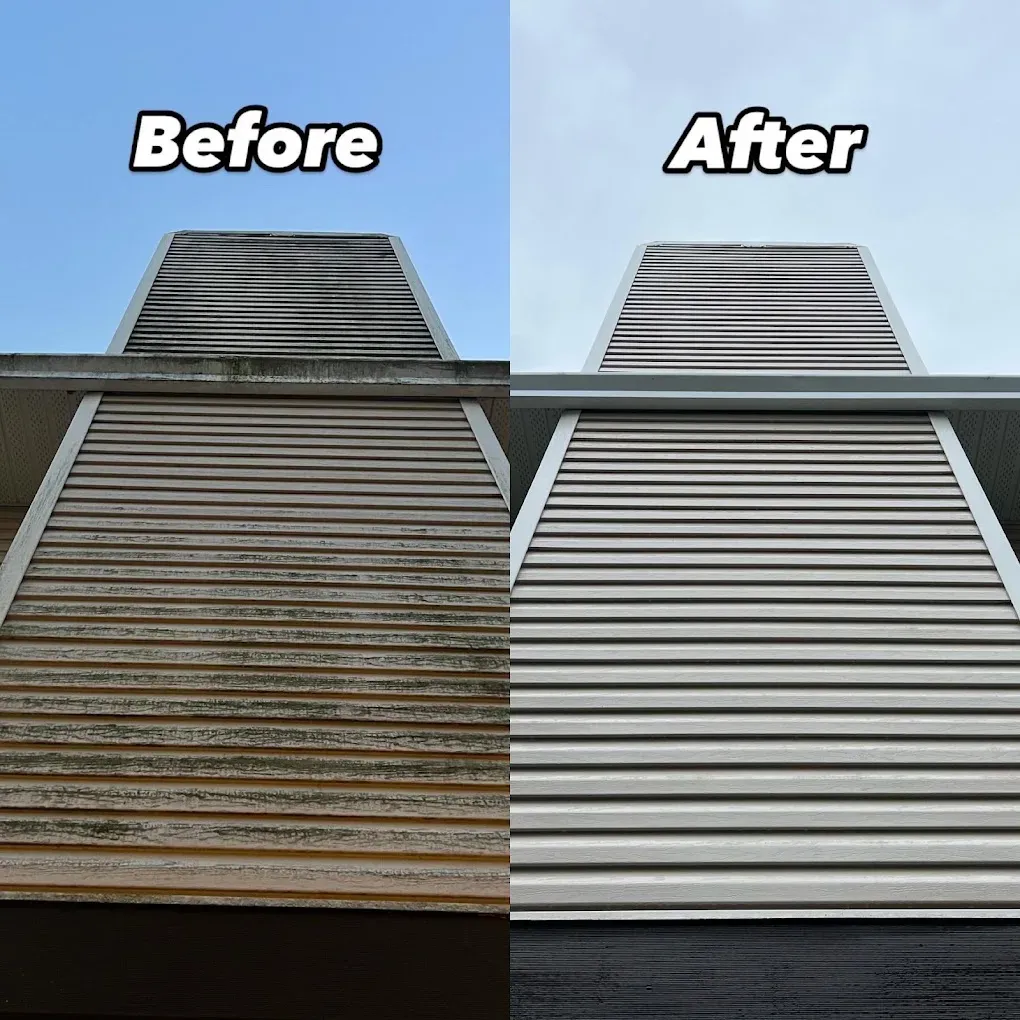 The fascia, soffit and siding of a gable end cleaned up